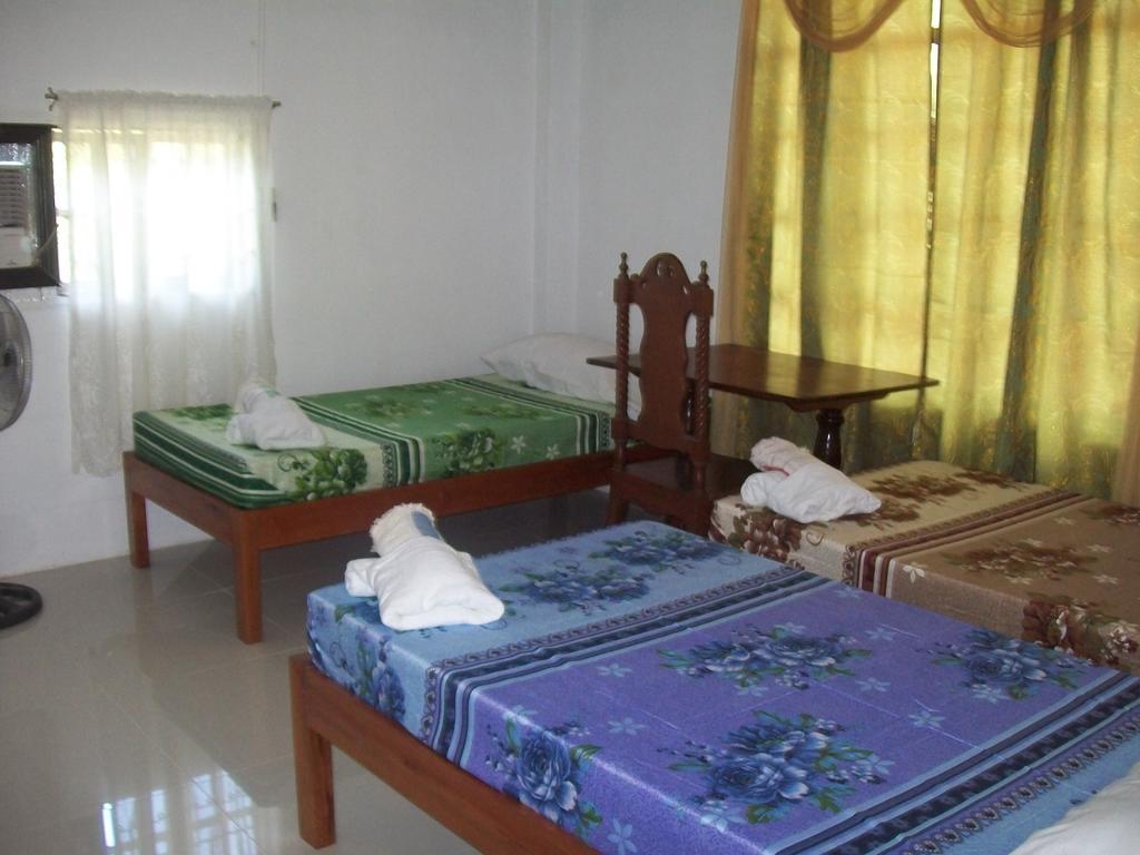 Charm Guest House Puerto Princesa Cameră foto